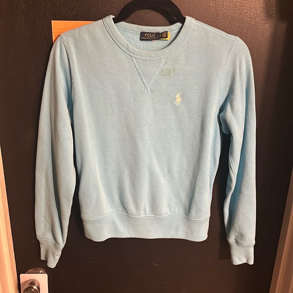 Polo babyblue the lighting is off so it doesn’t show how deep the blue .notfaded